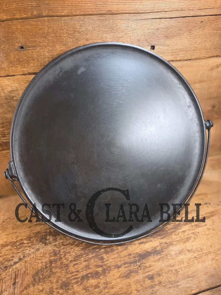 Ghostmarked 1910’s #742 Griswold No. 14 Round Griddle w/ Bail and Slant Logo. The largest made of its kind and hard to