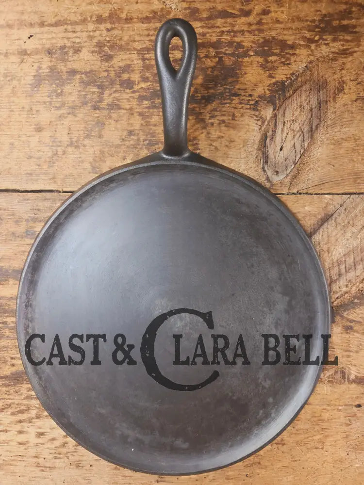 Gorgeous and not often seen #9 Puritan round griddle by Griswold. Perfect for everyday pancakes grilled cheese or oven