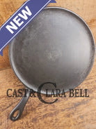 Gorgeous and not often seen #9 Puritan round griddle by Griswold. Perfect for everyday pancakes grilled cheese or oven