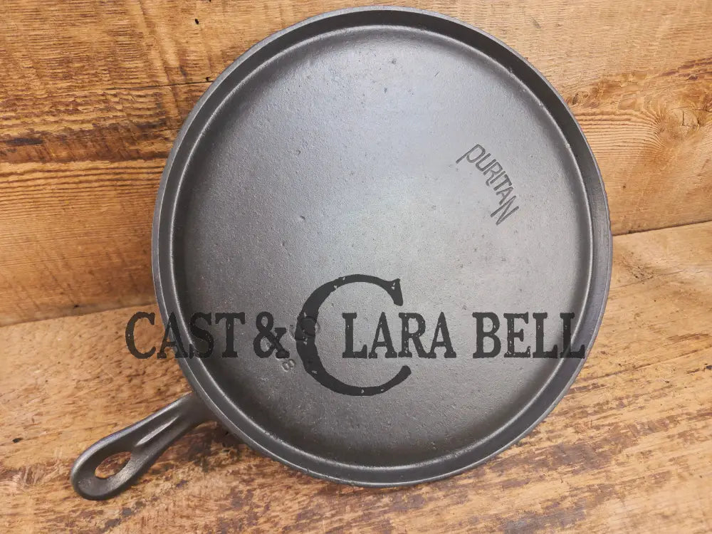 Gorgeous and not often seen #9 Puritan round griddle by Griswold. Perfect for everyday pancakes grilled cheese or oven