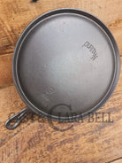 Gorgeous and not often seen #9 Puritan round griddle by Griswold. Perfect for everyday pancakes grilled cheese or oven