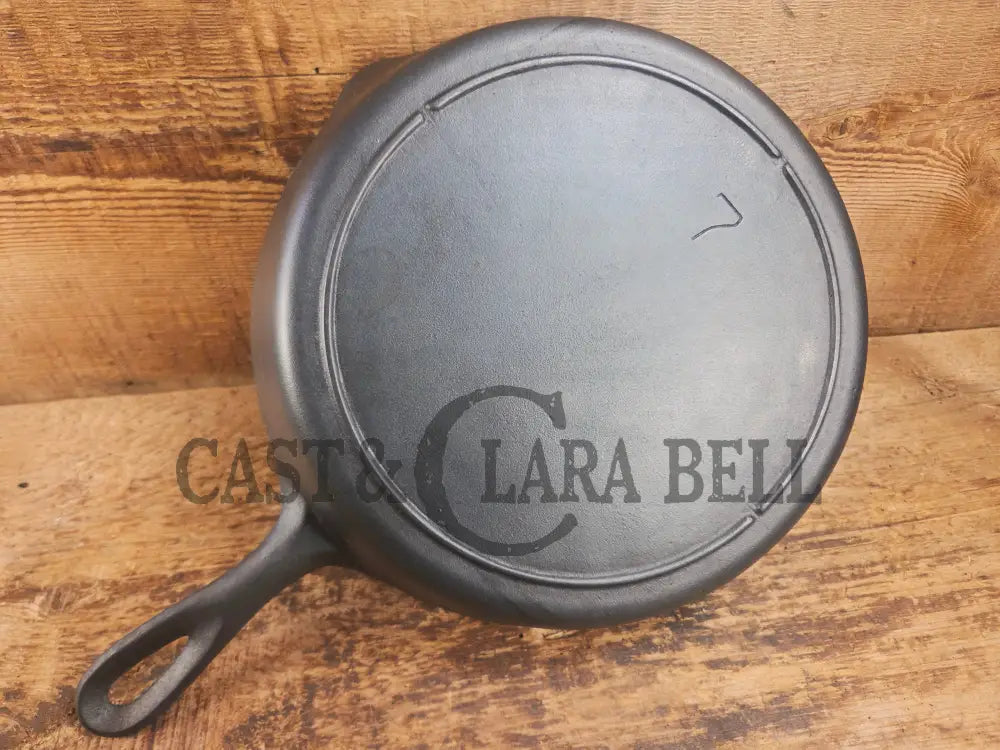 Gorgeous. Classic 1910’s Lodge #7 Cast Iron Skillet Three Notch. Light sleek and ready to cook with! Skillet