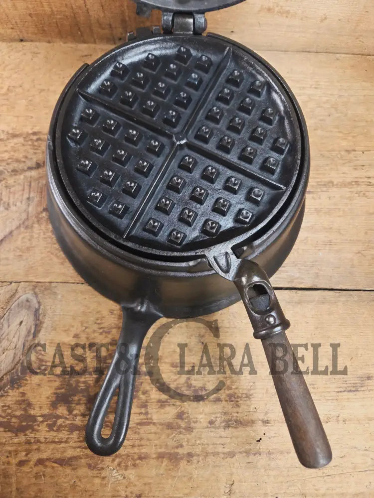 Gorgeous original complete Favorite Piqua tall base waffle iron. Hard to Find Est 1920’s and makes crispy waffles!