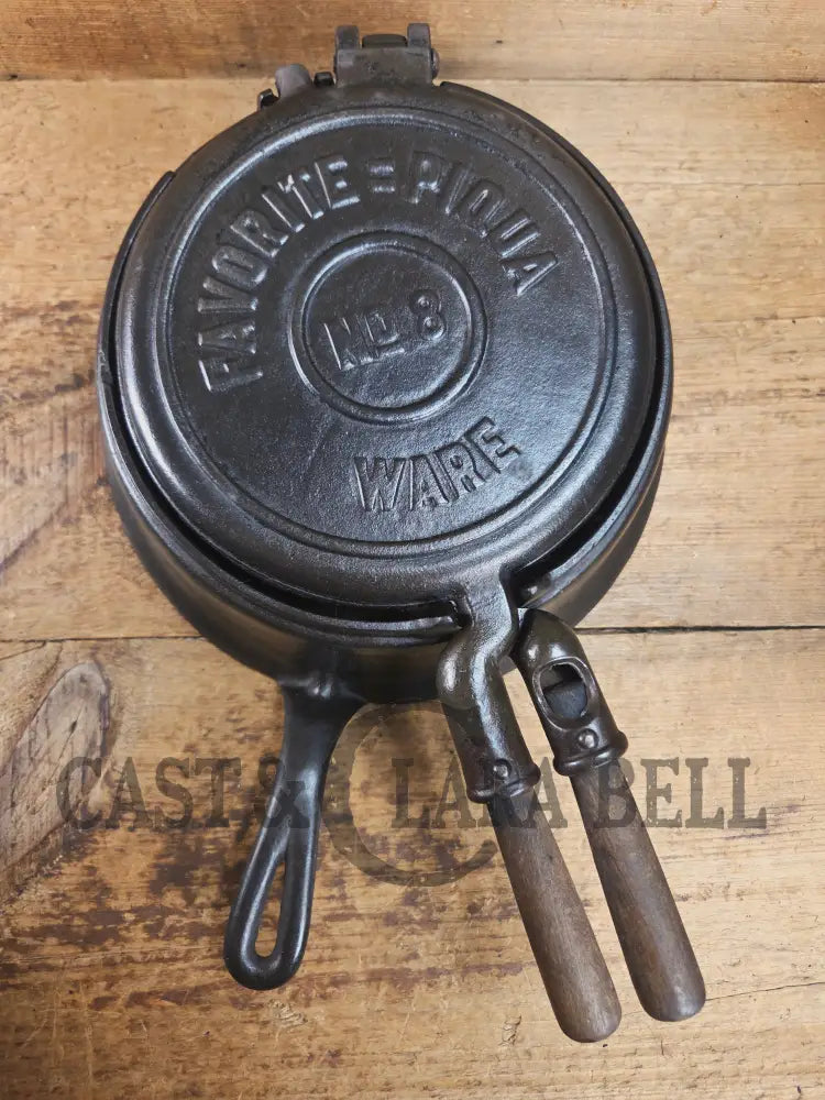 Gorgeous original complete Favorite Piqua tall base waffle iron. Hard to Find Est 1920’s and makes crispy waffles!