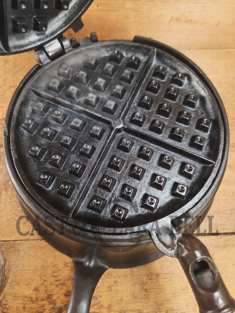 Gorgeous original complete Favorite Piqua tall base waffle iron. Hard to Find Est 1920’s and makes crispy waffles!