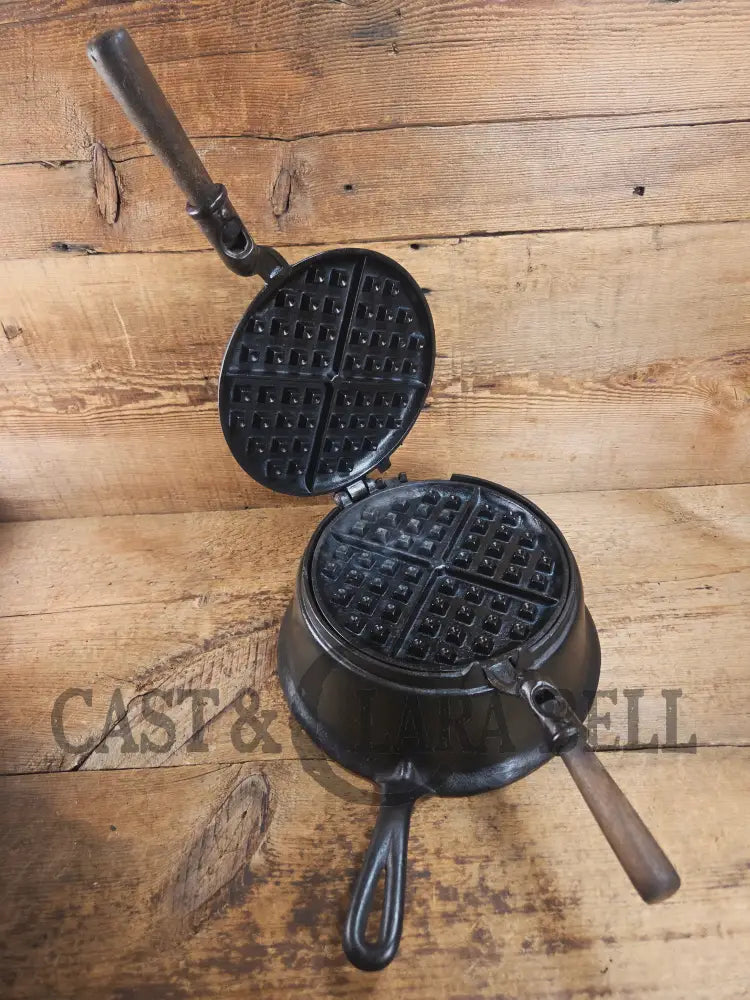 Gorgeous original complete Favorite Piqua tall base waffle iron. Hard to Find Est 1920’s and makes crispy waffles!