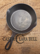 Gorgeous unique and hard to find! Early 1900’s Wagner Ware #5 A Arc Straight logo cast iron saute skillet. Beautiful