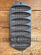 Great collectors piece! Griswold made Sears and Roebuck & Co. ’Best Made’ No. 273 Wheat Corn Stick Pan Bakeware