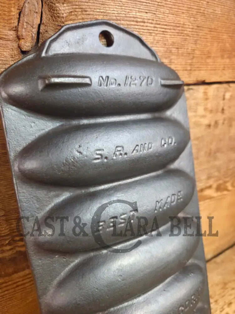 Great collectors piece! Griswold made Sears and Roebuck & Co. ’Best Made’ No. 273 Wheat Corn Stick Pan Bakeware