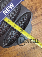 Great collectors piece! Griswold made Sears and Roebuck & Co. ’Best Made’ No. 273 Wheat Corn Stick Pan Bakeware