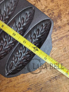 Great collectors piece! Griswold made Sears and Roebuck & Co. ’Best Made’ No. 273 Wheat Corn Stick Pan Bakeware
