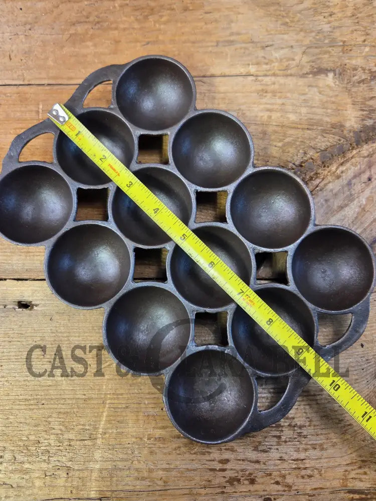 Great gift! 1930’s #9 Wagner ’golf ball’ brownie pan. Open air design gorgeous!