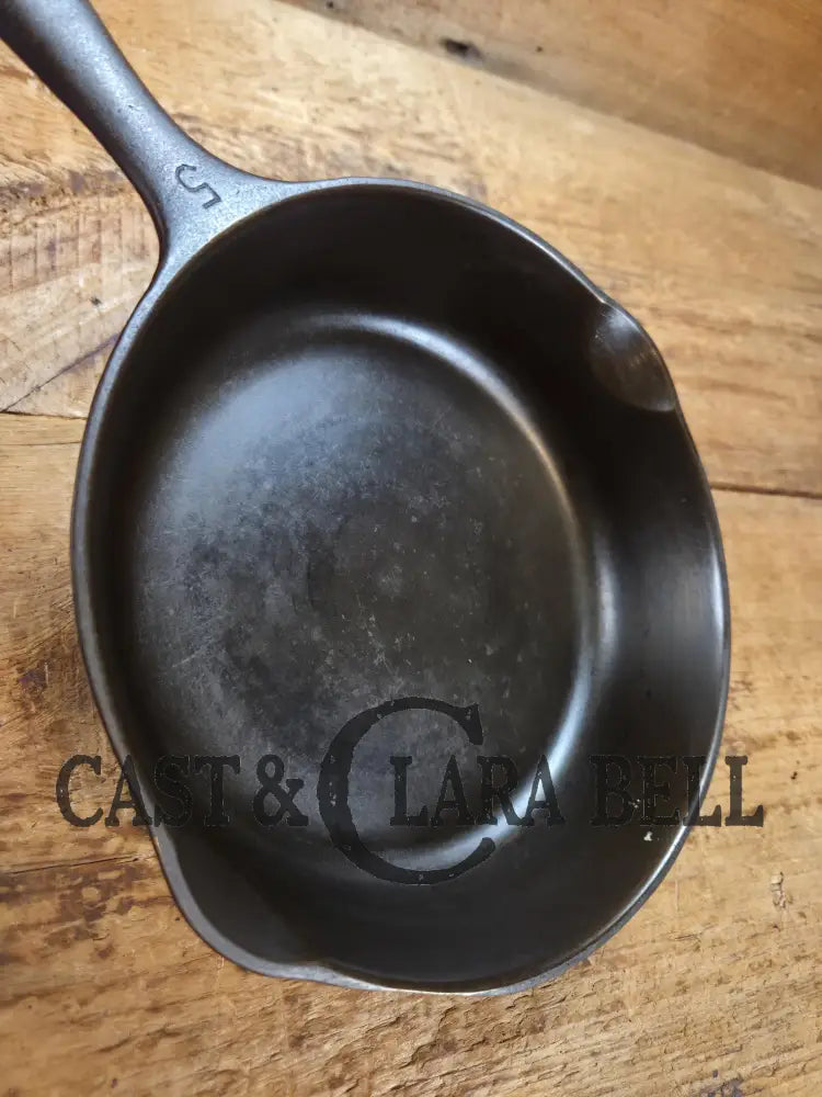 Great saute skillet! Wagner Ware #5 cast iron Skillet with Stylized Logo and Smooth Bottom 1055 E. SC24 Skillet