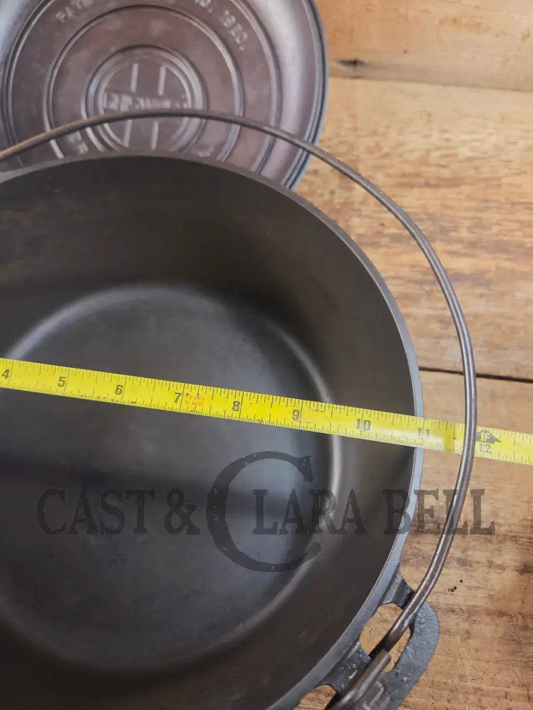 Hard to find 1920’s Griswold #9 Dutch Oven w/ Slant Logo p/n 834 H and p/n 2552 A matching block lid Dutch Ovens