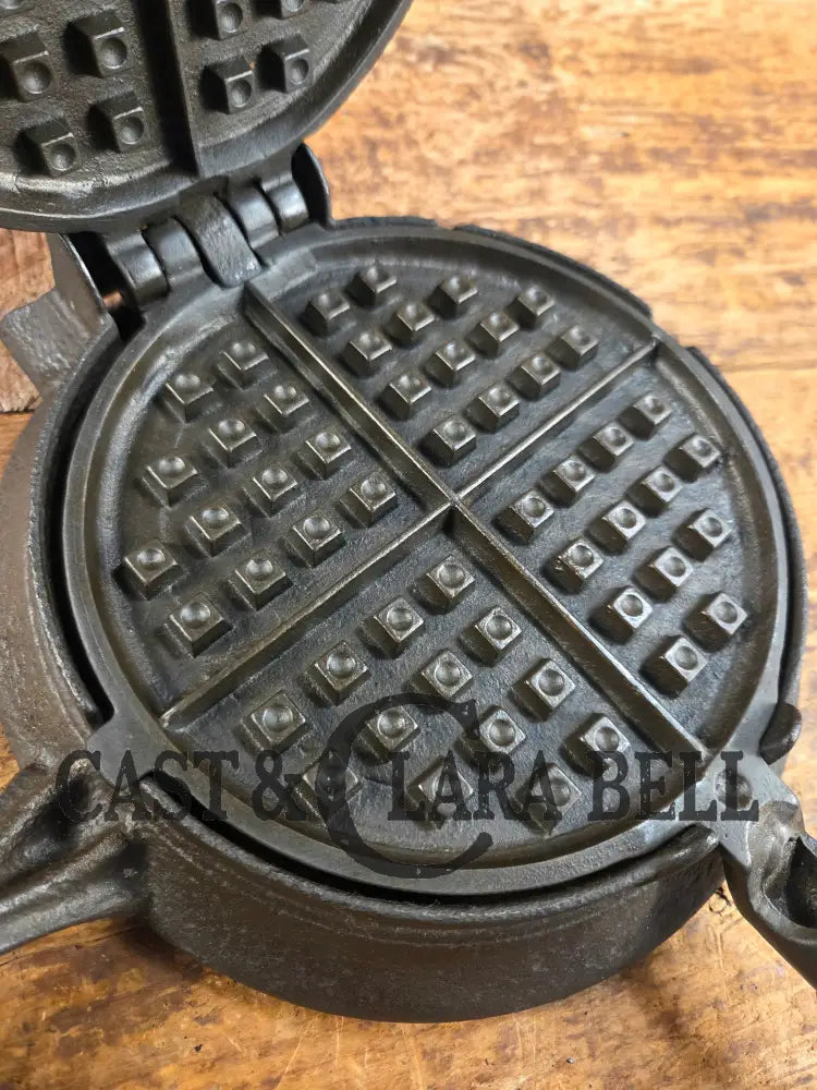 Hard to find and Beautiful!! 1880’s Griswold No. 7 Waffle Iron with low button hinge base. Don’t miss this one Waffle