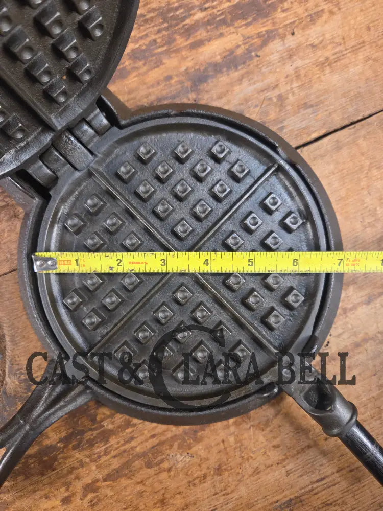 Hard to find and Beautiful!! 1880’s Griswold No. 7 Waffle Iron with low button hinge base. Don’t miss this one Waffle