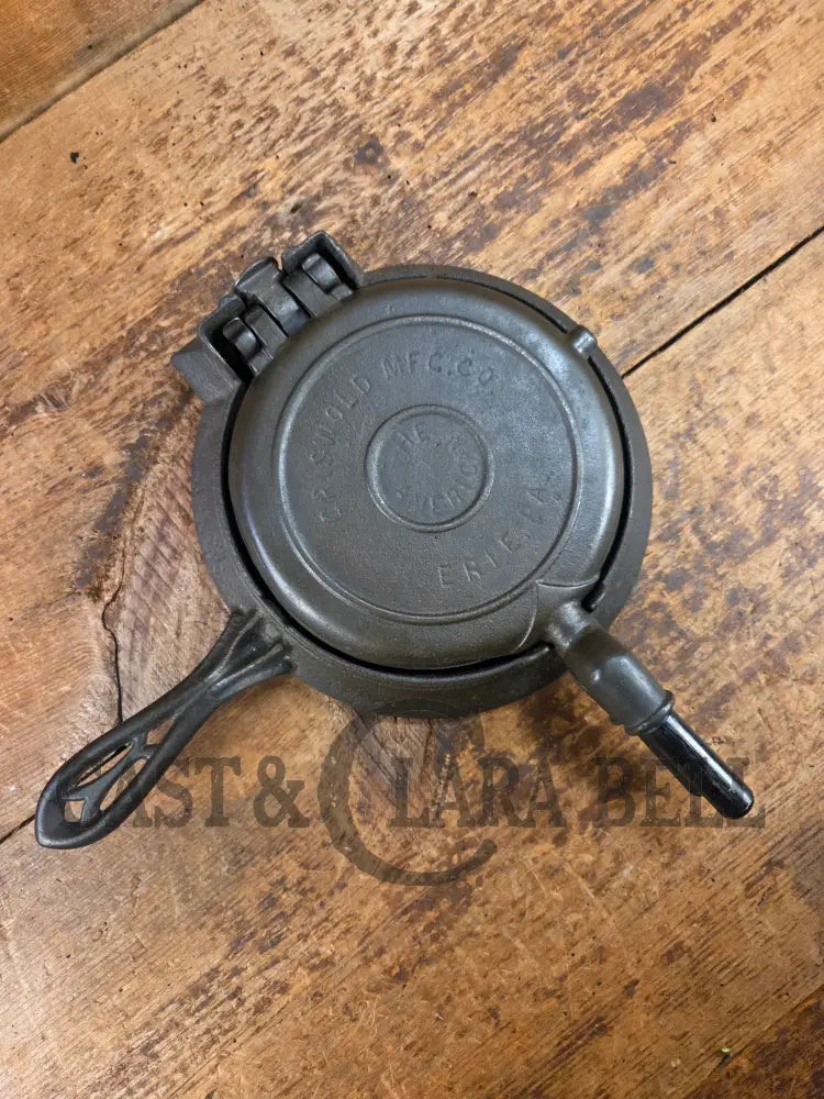 Hard to find and Beautiful!! 1880’s Griswold No. 7 Waffle Iron with low button hinge base. Don’t miss this one Waffle