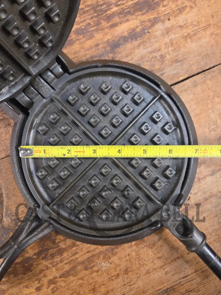 Hard to find and Beautiful!! 1880’s Griswold No. 7 Waffle Iron with low button hinge base. Don’t miss this one Waffle