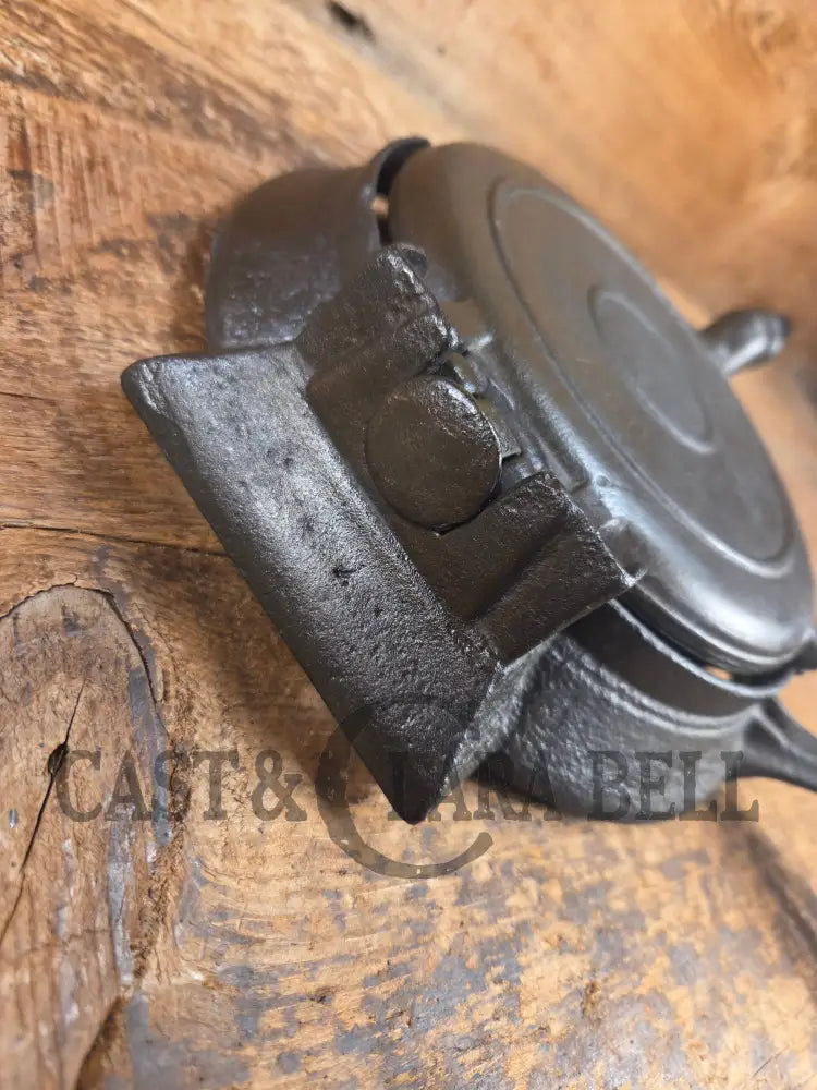 Hard to find and Beautiful!! 1880’s Griswold No. 7 Waffle Iron with low button hinge base. Don’t miss this one Waffle