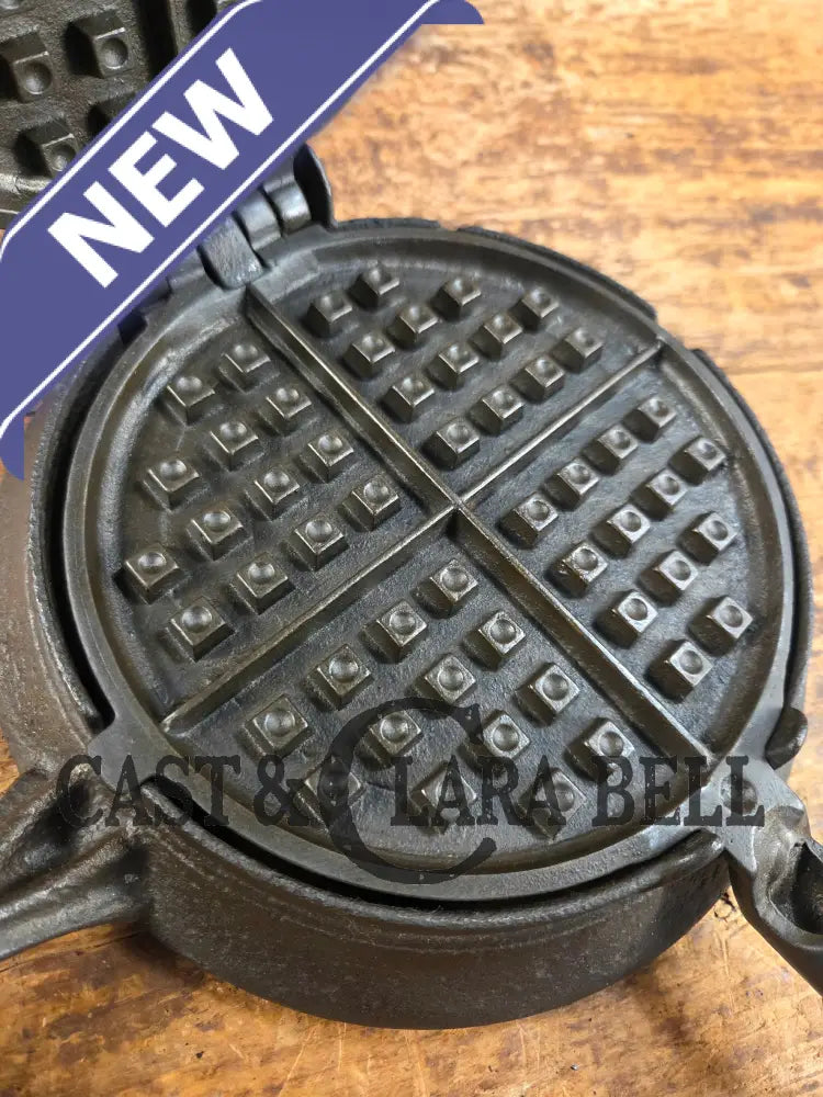 Hard to find and Beautiful!! 1880’s Griswold No. 7 Waffle Iron with low button hinge base. Don’t miss this one Waffle