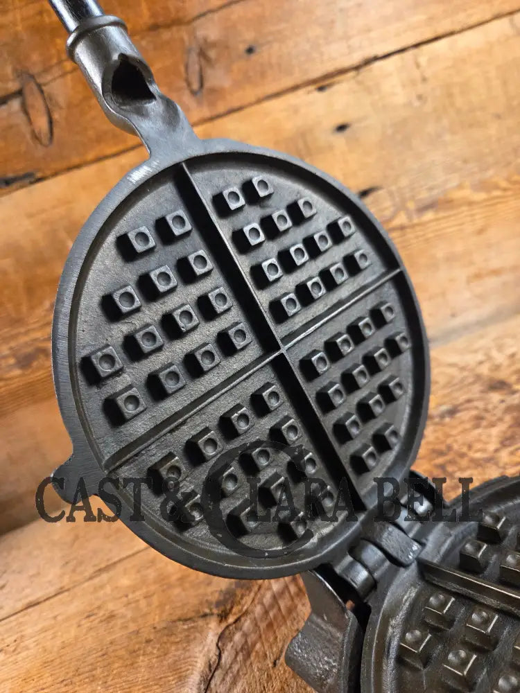 Hard to find and Beautiful!! 1880’s Griswold No. 7 Waffle Iron with low button hinge base. Don’t miss this one Waffle