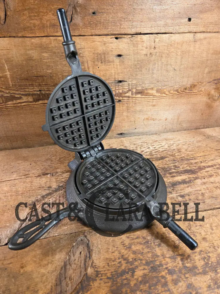 Hard to find and Beautiful!! 1880’s Griswold No. 7 Waffle Iron with low button hinge base. Don’t miss this one Waffle
