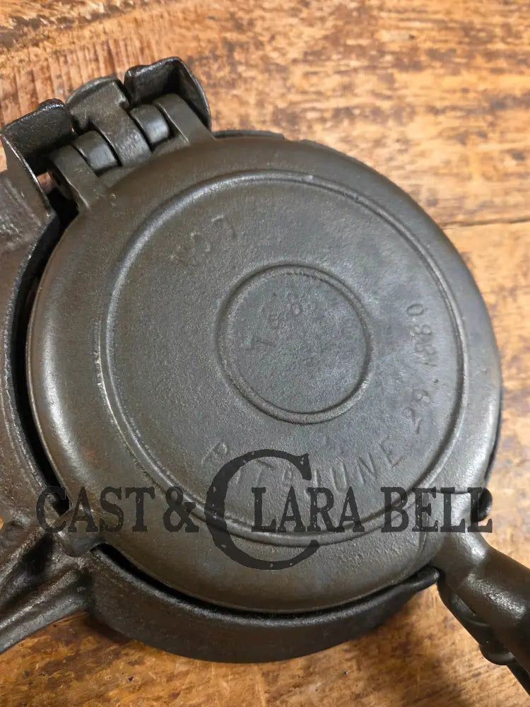 Hard to find and Beautiful!! 1880’s Griswold No. 7 Waffle Iron with low button hinge base. Don’t miss this one Waffle
