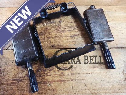 Hard to find and priced to sell! 1910’s Era Wagner Waffle Iron with matching bailed base. Don’t miss this one! Waffle
