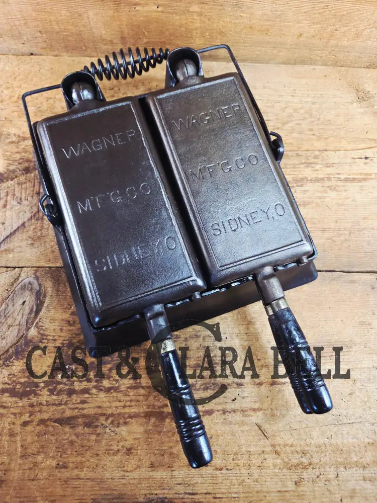 Hard to find and priced to sell! 1910’s Era Wagner Waffle Iron with matching bailed base. Don’t miss this one! Waffle