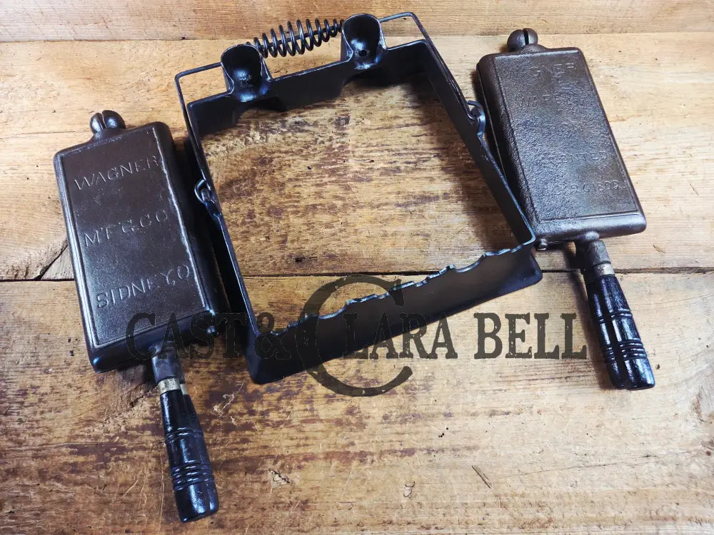 Hard to find and priced to sell! 1910’s Era Wagner Waffle Iron with matching bailed base. Don’t miss this one! Waffle