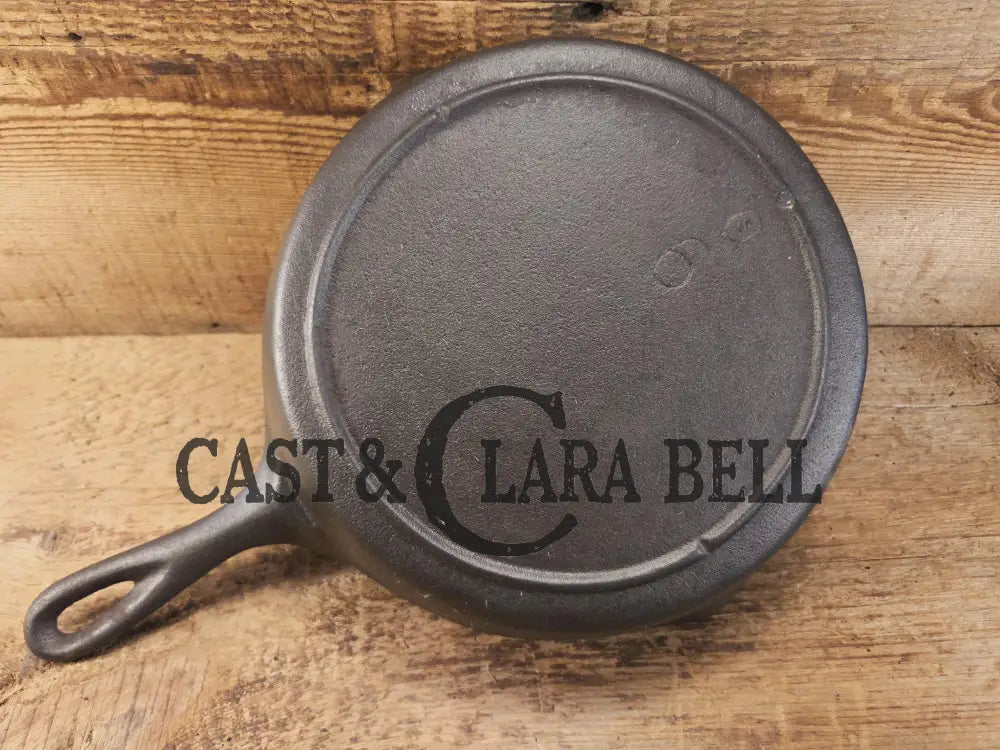 Hard to find in the Lodge Blob Series. 1930’s Lodge #6 Cast Iron Skillet with 3 Notch Heat Ring. Raised Blob makers