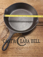 Hard to find in the Lodge Blob Series. 1930’s Lodge #6 Cast Iron Skillet with 3 Notch Heat Ring. Raised Blob makers