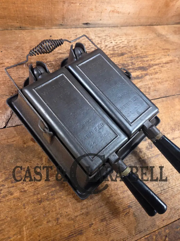 Hard to find showstopper! 1910’s Era Wagner Waffle Iron with matching bailed base. Don’t miss this one Waffle Iron