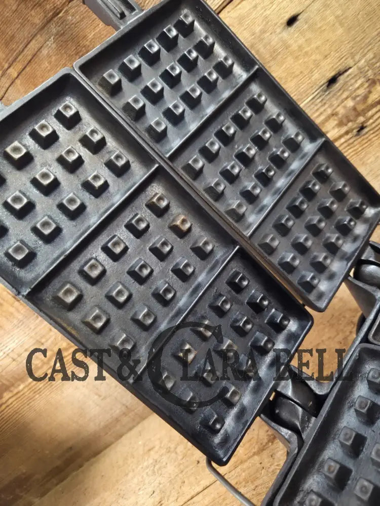 Hard to find showstopper! 1910’s Era Wagner Waffle Iron with matching bailed base. Don’t miss this one! Waffle Iron