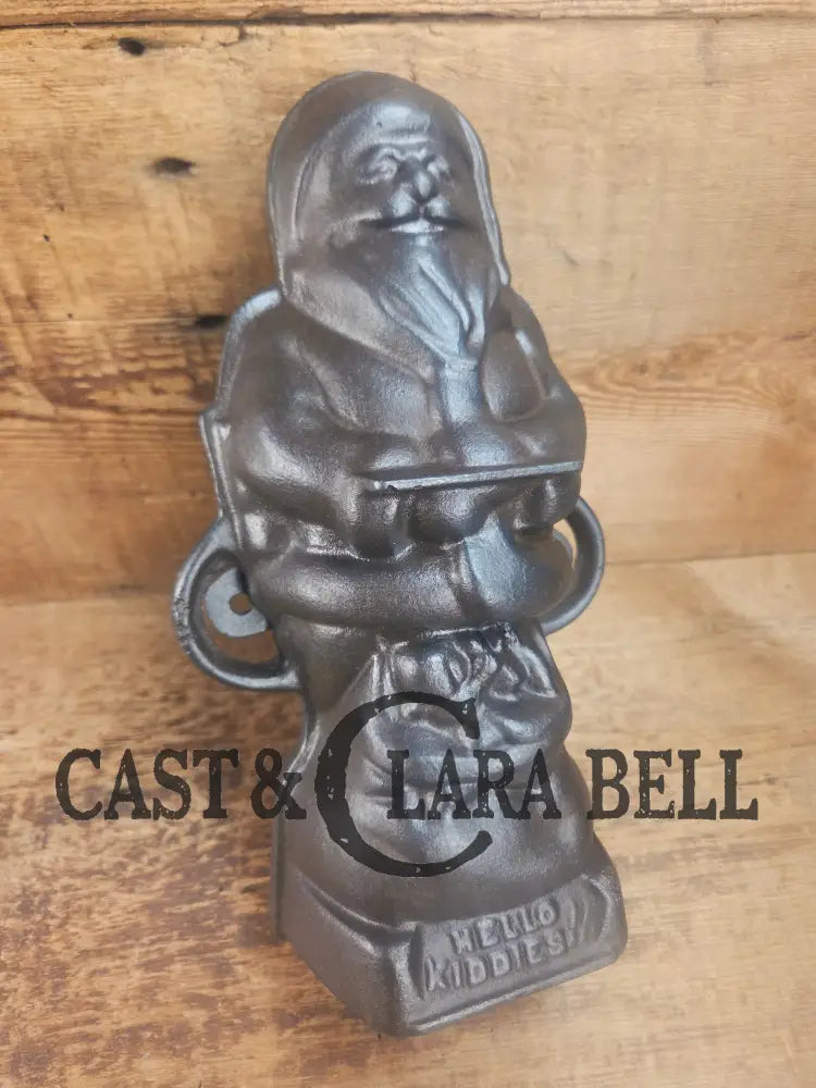 Ho Ho Hold the SHOW!! The Authentic #897/898 Griswold SANTA Cake Mold (Hello Kiddies!). Many copies are out there see