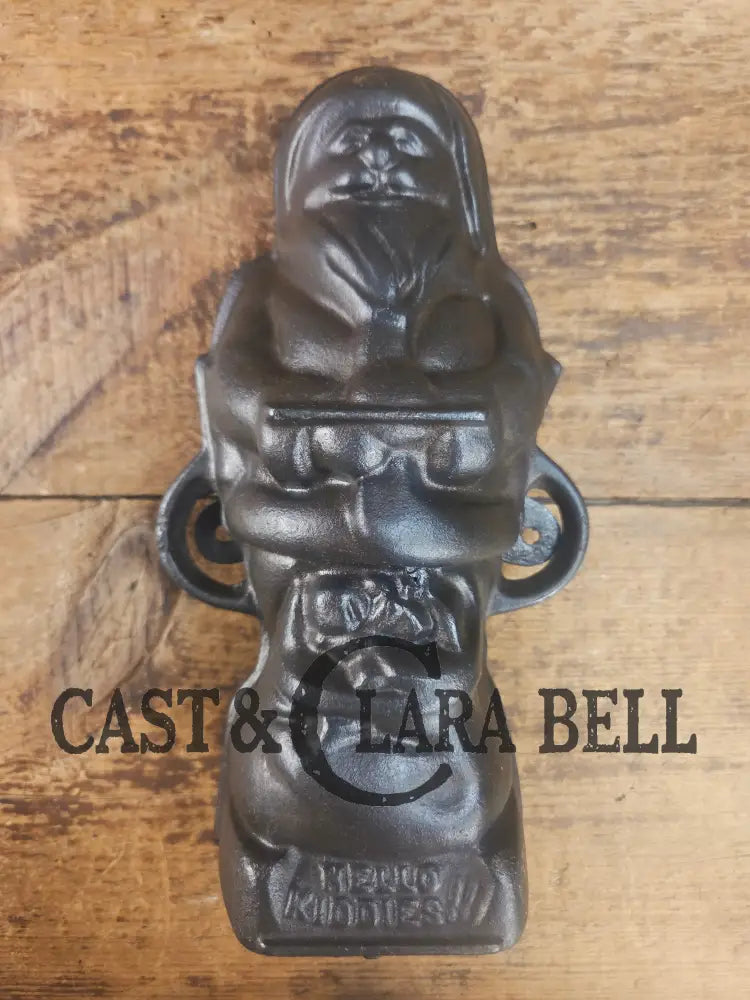 Ho Ho Hold the SHOW!! The Authentic #897/898 Griswold SANTA Cake Mold (Hello Kiddies!). Many copies are out there see