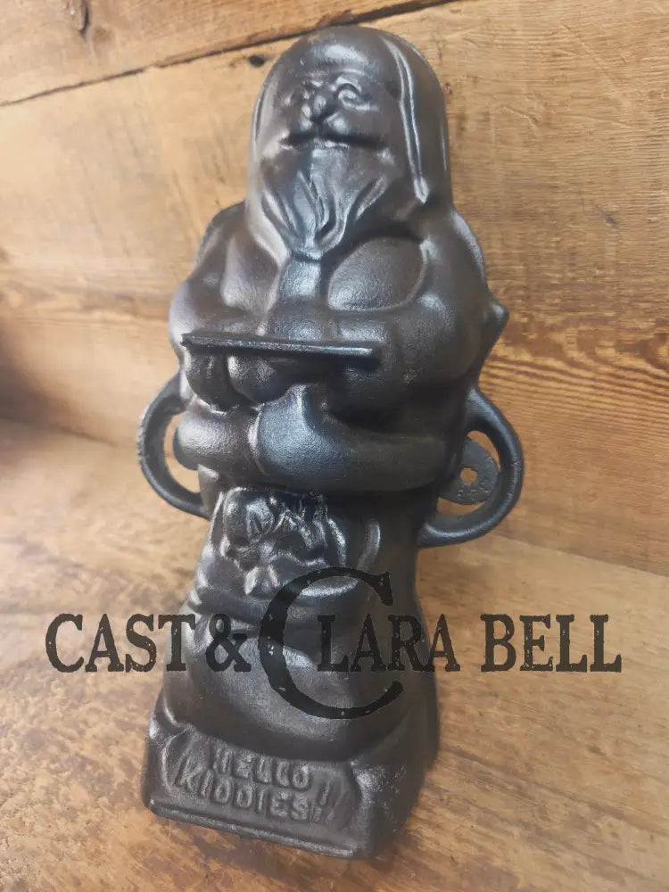 Ho Ho Hold the SHOW!! The Authentic #897/898 Griswold SANTA Cake Mold (Hello Kiddies!). Many copies are out there see