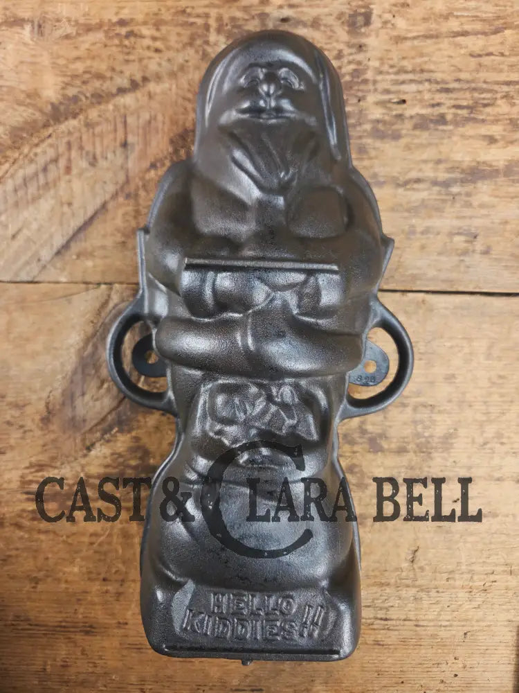 Ho Ho Hold the SHOW!! The Authentic #897/898 Griswold SANTA Cake Mold (Hello Kiddies!). Many copies are out there see