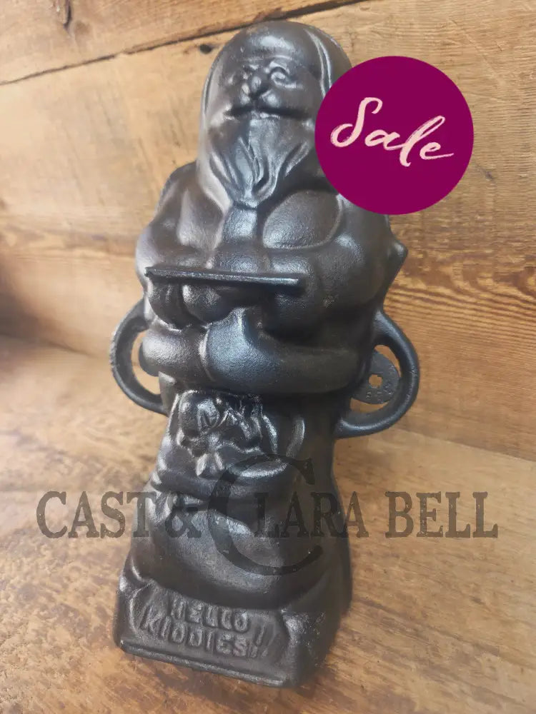 Ho Ho Hold the SHOW!! The Authentic #897/898 Griswold SANTA Cake Mold (Hello Kiddies!). Many copies are out there see