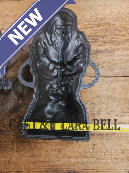 Ho Ho Hold the SHOW!! The Authentic #897/898 Griswold SANTA Cake Mold (Hello Kiddies!). Many copies are out there see