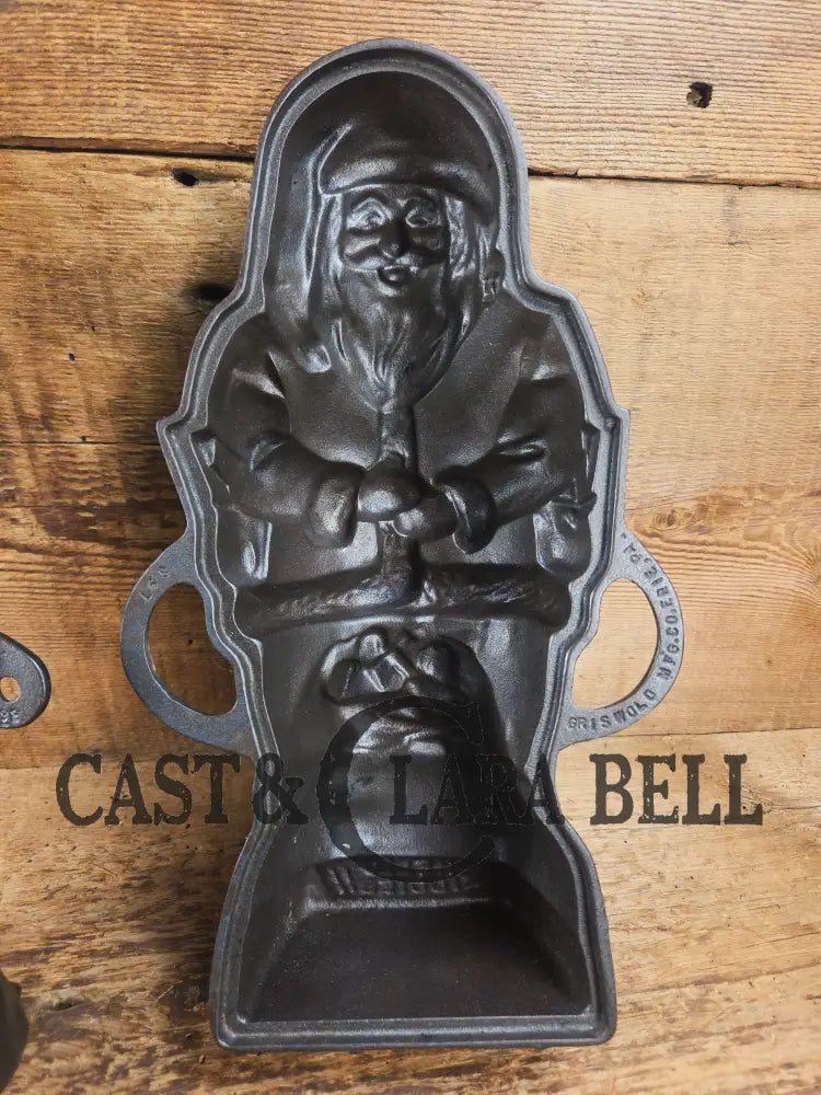 Ho Ho Hold the SHOW!! The Authentic #897/898 Griswold SANTA Cake Mold (Hello Kiddies!). Many copies are out there see