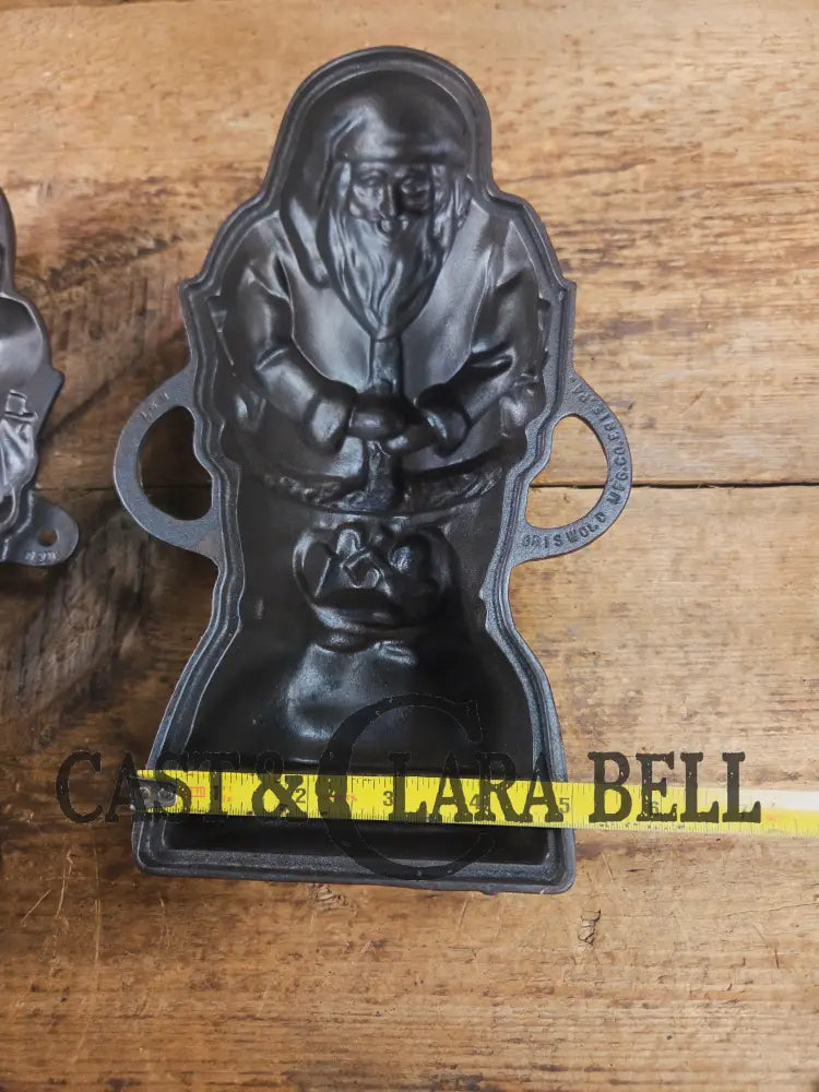 Ho Ho Hold the SHOW!! The Authentic #897/898 Griswold SANTA Cake Mold (Hello Kiddies!). Many copies are out there see