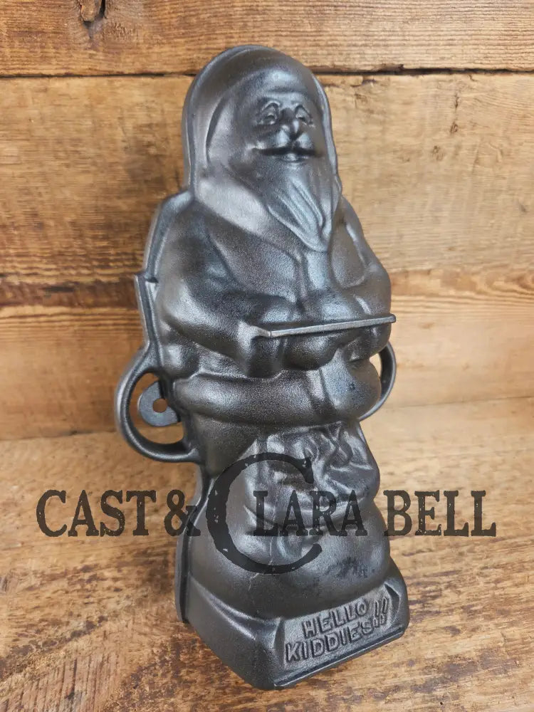 Ho Ho Hold the SHOW!! The Authentic #897/898 Griswold SANTA Cake Mold (Hello Kiddies!). Many copies are out there see