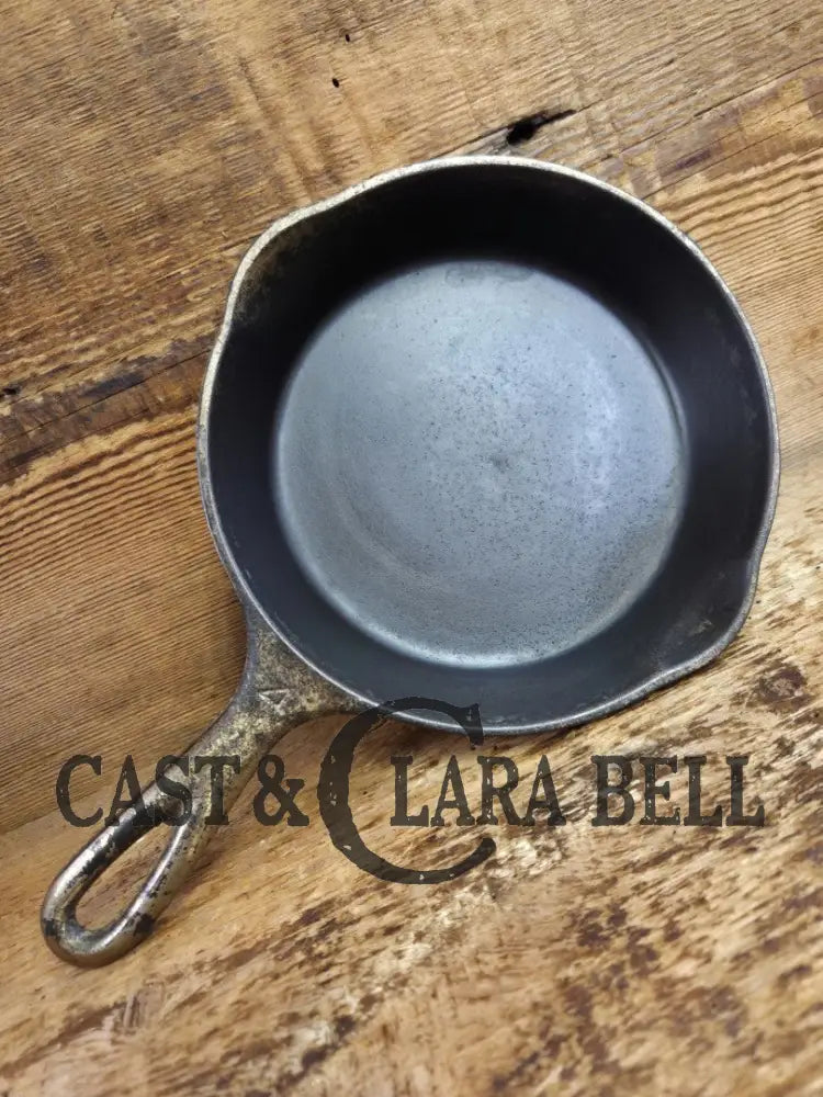 HTF! 1924 Wagner Ware #4 Cast Iron Skillet with Heat Ring 1054. Plating outside black iron inside. Beautiful patina!