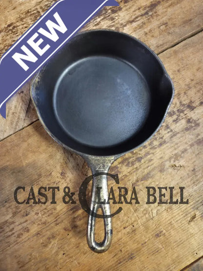 HTF! 1924 Wagner Ware #4 Cast Iron Skillet with Heat Ring 1054. Plating outside black iron inside. Beautiful patina!