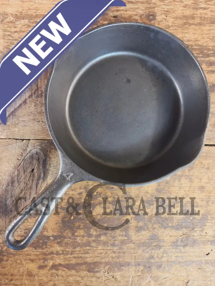 HTF! 1924 Wagner Ware #4 Cast Iron Skillet with Heat Ring 1054. Plating outside black iron inside. Beautiful patina!
