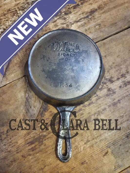 HTF! 1924 Wagner Ware #4 Cast Iron Skillet with Heat Ring 1054. Plating outside black iron inside. Beautiful patina!
