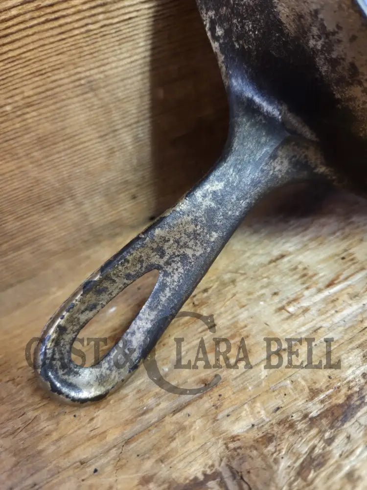 HTF! 1924 Wagner Ware #4 Cast Iron Skillet with Heat Ring 1054. Plating outside black iron inside. Beautiful patina!