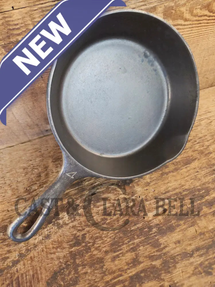 HTF! 1924 Wagner Ware #4 Cast Iron Skillet with Heat Ring 1054. Plating outside black iron inside. Beautiful patina!