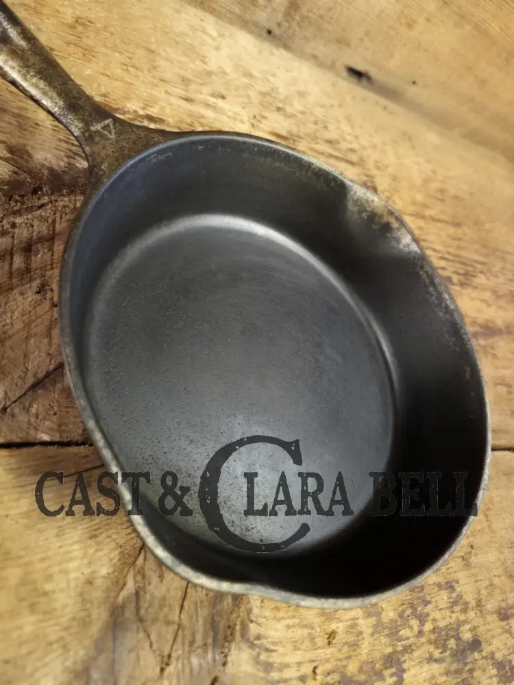 HTF! 1924 Wagner Ware #4 Cast Iron Skillet with Heat Ring 1054. Plating outside black iron inside. Beautiful patina!